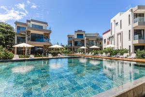 Bazén v ubytování Apartment Beachfront Ocean Terraces Residence, Poste Lafayette-Apt-C1 nebo v jeho okolí
