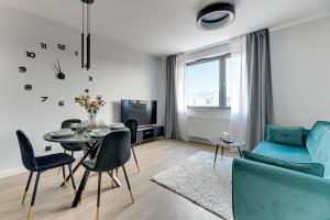 Posezení v ubytování SCALA City Center by Downtown Apartments