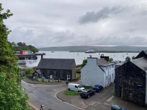 a view of a town with a body of water at Wee Dram in Tobermory
