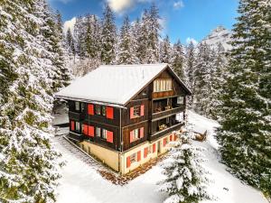 Chalet Pradella by Arosa Holiday v zimě