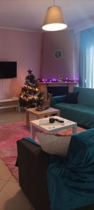 Posezení v ubytování Soyzana Family Apartment