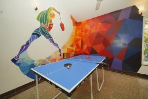Stolní tenis v ubytování Bay Breeze Suites nebo okolí