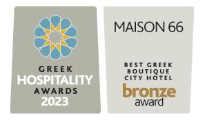two posters for the masson best green boulder city hotel at Maison 66, Riviera Hotels in Athens