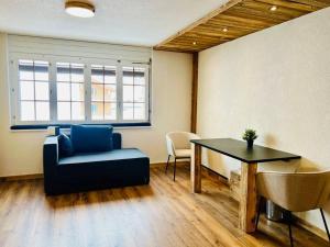 Posezení v ubytování Chaleureux studio au centre