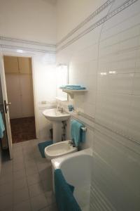 Koupelna v ubytování suite tra i tetti con bagno privato