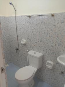 Koupelna v ubytování TFC Homestay