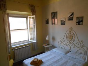 Postel nebo postele na pokoji v ubytování suite tra i tetti con bagno privato