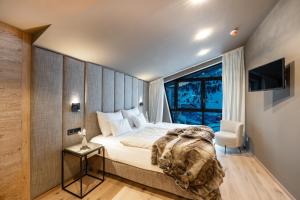 Letto o letti in una camera di Das Kohlmayr Superior