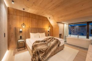 Letto o letti in una camera di Das Kohlmayr Superior