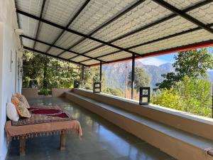 Balkón nebo terasa v ubytování Dunagiri Retreat