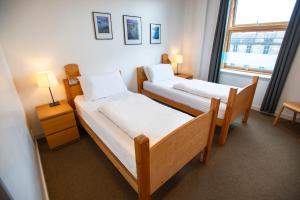 Postel nebo postele na pokoji v ubytování Edinburgh Central Accommodation