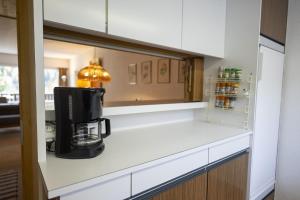 Kuchyň nebo kuchyňský kout v ubytování Brentschpark Wohnung 72