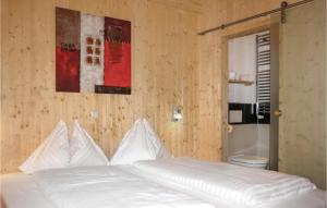 Ein Bett oder Betten in einem Zimmer der Unterkunft Nice Home In Turrach With 4 Bedrooms And Internet