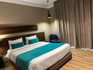 Postel nebo postele na pokoji v ubytování Yto boutique Hotel
