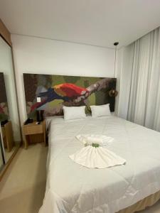 Cama ou camas em um quarto em Apartamento Ecoresort Capivari