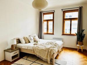 Postel nebo postele na pokoji v ubytování Big family apartment
