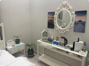 Postel nebo postele na pokoji v ubytování Al Aseel Apartment Buyoot Al Diyafah