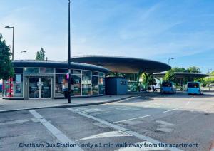 a bus station with a mini walkway from the apartment at Chatham Serviced Apartments by Hosty Lets in Chatham