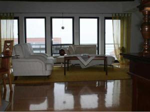 a living room with a couch and a coffee table at Ferienwohnung "Im Alten Gut" in Schaderode