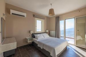 Ένα ή περισσότερα κρεβάτια σε δωμάτιο στο Remvi Villa +16 φωτογραφίες