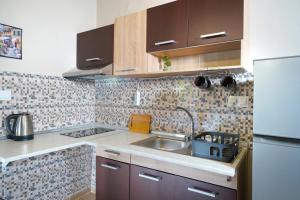 Η κουζίνα ή μικρή κουζίνα στο Mulberry Apartment