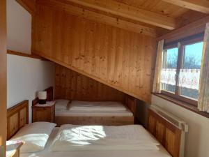 Postel nebo postele na pokoji v ubytování Apartment Lärchenheim