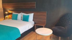 Postel nebo postele na pokoji v ubytování Yto boutique Hotel