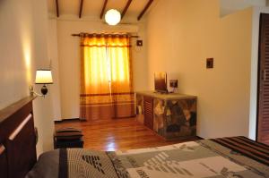 Postel nebo postele na pokoji v ubytování Asantha Guest House