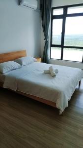 Un pat sau paturi într-o cameră la 静等风来28 +10 fotografii