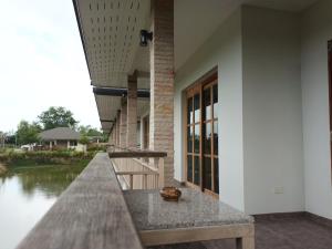 The Happy Home Cha-am เดอะ แฮปปี้ โฮม ชะอำ的阳台或露台