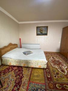Postel nebo postele na pokoji v ubytování Madoyan Guest house