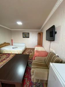 TV a/nebo společenská místnost v ubytování Madoyan Guest house