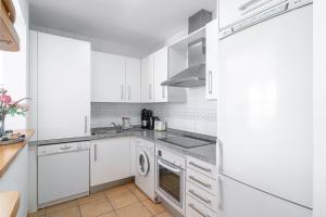 Kuchyň nebo kuchyňský kout v ubytování Tamango Hill Alcazaba B Casasol