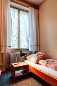 Letto o letti in una camera di Chrischona Berg