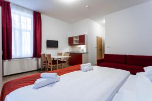 Postel nebo postele na pokoji v ubytování Apartmánový komplex Dagmar