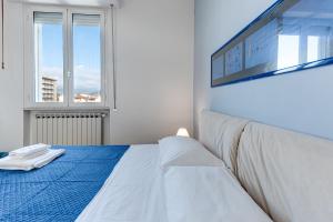 A bed or beds in a room at A Casa di Sara 3