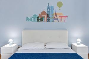 A bed or beds in a room at A Casa di Sara 3