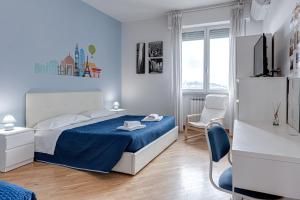 A bed or beds in a room at A Casa di Sara 3