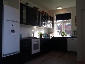 Kuchyň nebo kuchyňský kout v ubytování Hals Hotel