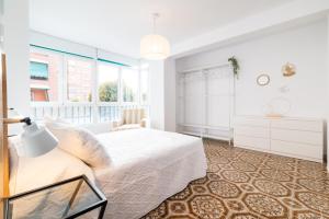 Postel nebo postele na pokoji v ubytování Piso junto a Parque de las Ciencias en Granada