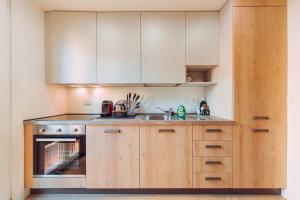 Kuchyň nebo kuchyňský kout v ubytování Loft Santo Stefano-Sant’Orsola + 42 fotografií