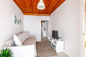 TV a/nebo společenská místnost v ubytování Casa da Praya