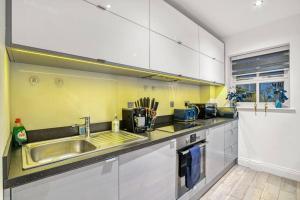 Kjøkken eller kjøkkenkrok på Luxury Oasis