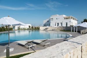 Der Swimmingpool an oder in der Nähe von Cala Ponte Hotel