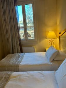 A bed or beds in a room at Zanhotel Tre Vecchi