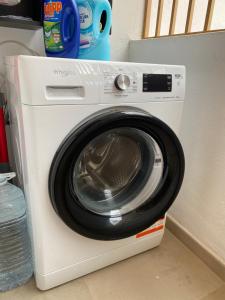 a white washing machine sitting in a kitchen at Bouganvilla in Adeje