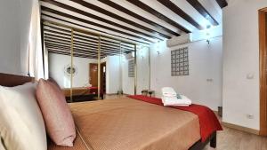 Posteľ alebo postele v izbe v ubytovaní Apartamento SWEET HOME TOLEDO