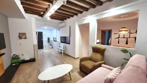 Televízia a/alebo spoločenská miestnosť v ubytovaní Apartamento SWEET HOME TOLEDO