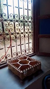 a box sitting in front of a gate at Dar l'mamoun in Ouarzazate