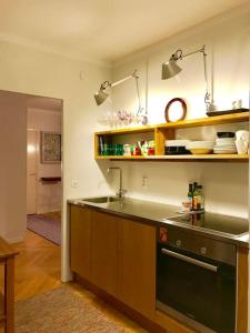 a kitchen with a sink and a counter top at Scandinavian design apartment in the center in Rovaniemi